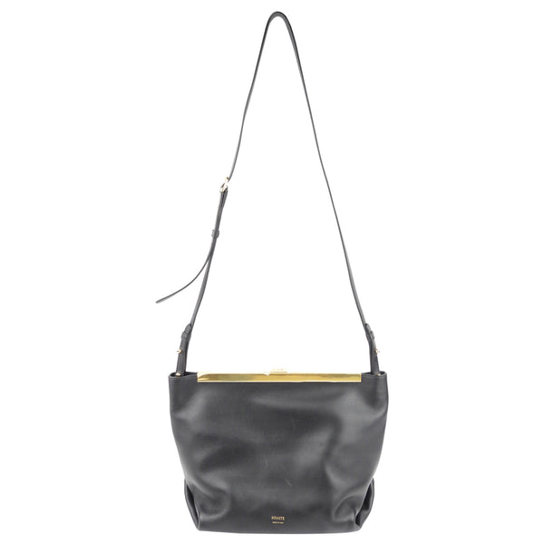 Shop Khaite Augusta Envelope Pleat Frame Leather Crossbody Bag