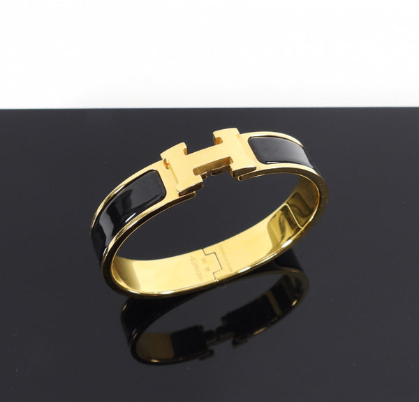 Shop HERMES Clic H bracelet PM Rose Gold / Black by CHARIOTLONDON