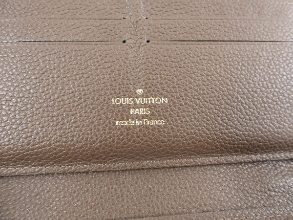 Portefeuille Secret Long en cuir monogram empreinte ombre - Louis Vuitton