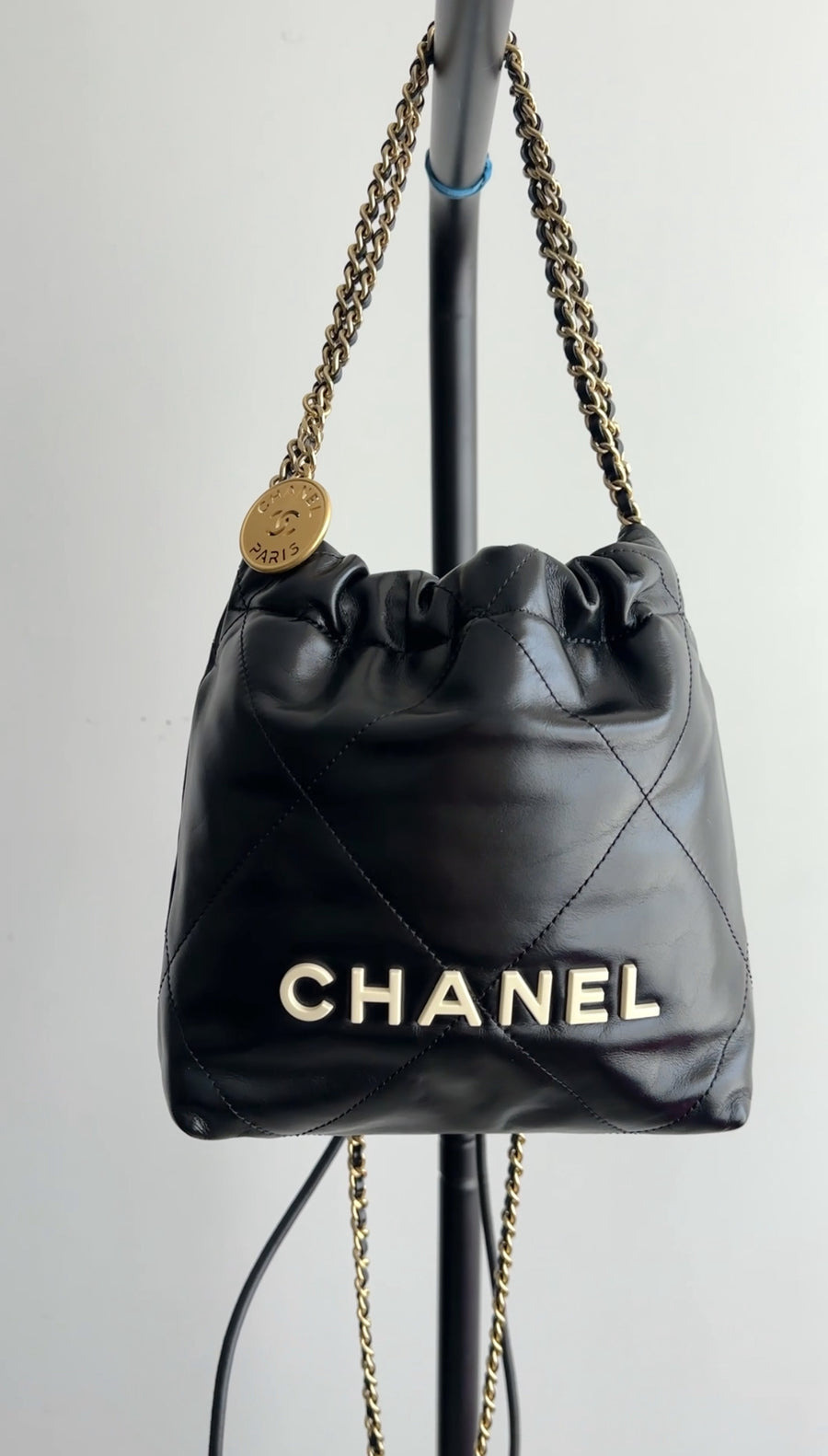 Chanel 2023 Black Leather Chain 22 Mini Bag with Ivory Enamel Logo