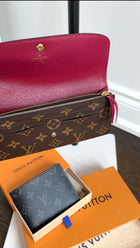 Louis Vuitton Monogram Coated Canvas Emilie Wallet