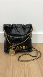 Chanel Black Leather Chain 22 Mini Bag with Goldtone Spellout Logo