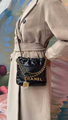 Chanel Black Leather Chain 22 Mini Bag with Goldtone Spellout Logo