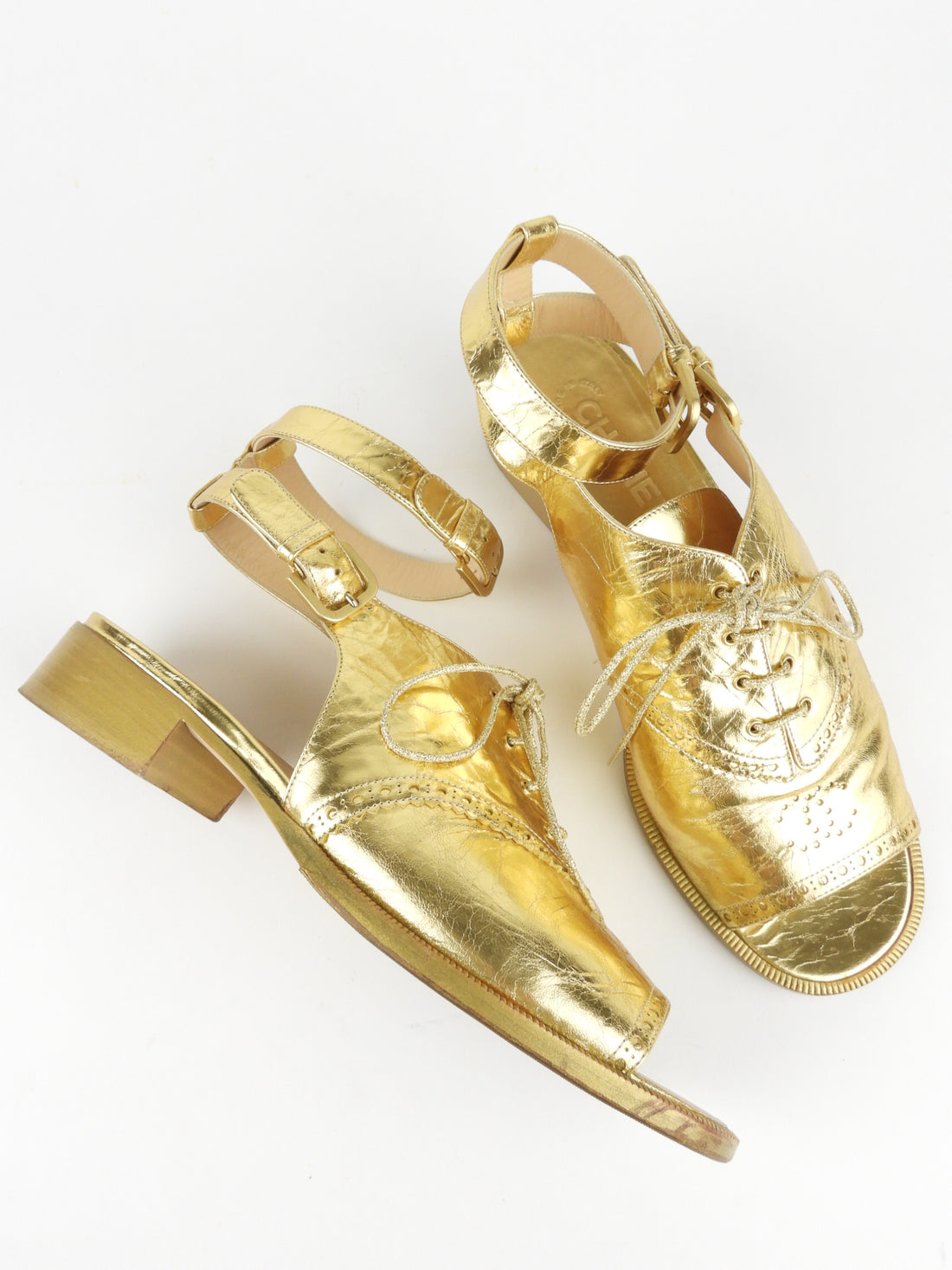 Chanel gold sale mules