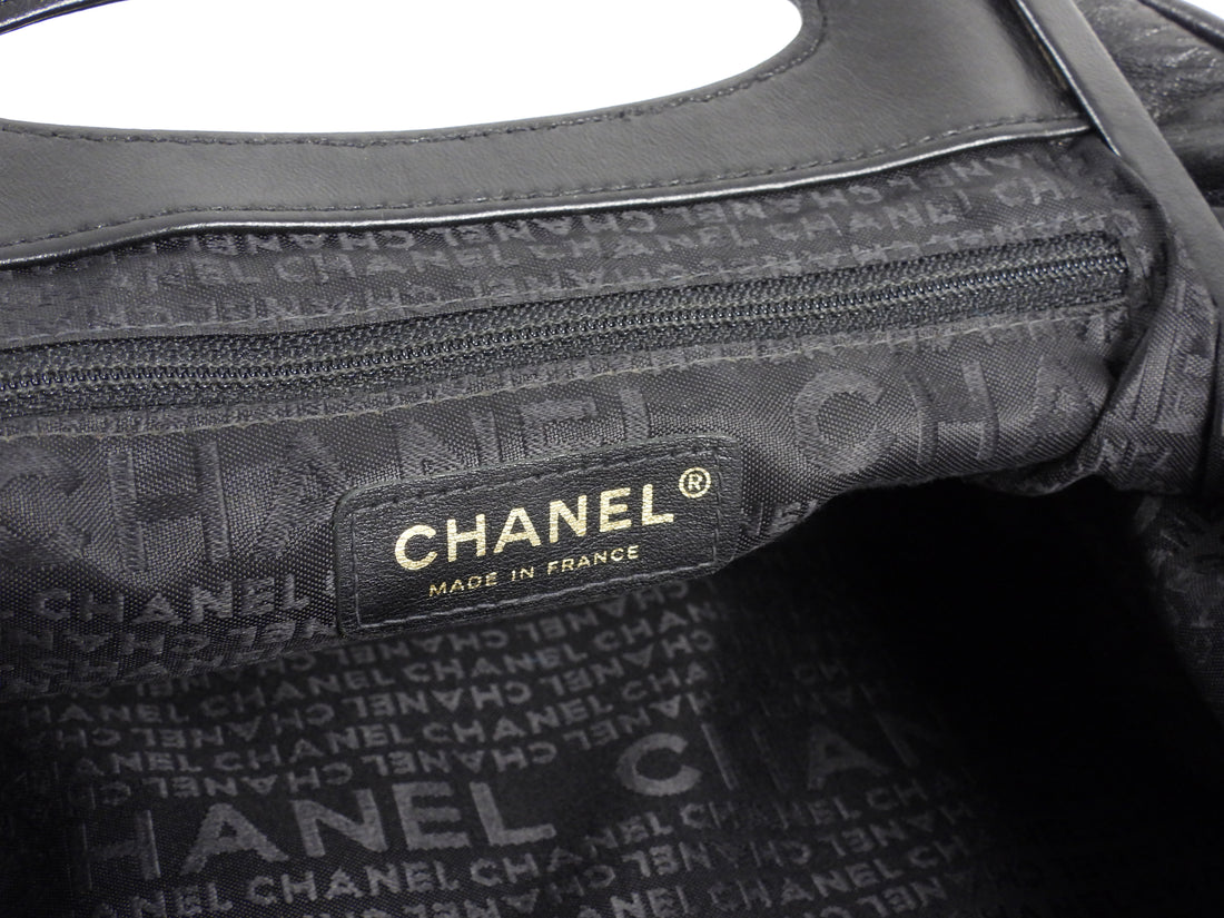 Chanel vintage 2003 Leather Camelia Frame Clutch Bag