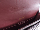Chanel Black Lambskin CC Maxi Classic Double Flap GHW