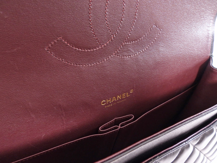 Chanel Black Lambskin CC Maxi Classic Double Flap GHW