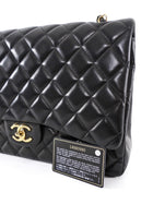 Chanel Black Lambskin CC Maxi Classic Double Flap GHW