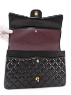 Chanel Black Lambskin CC Maxi Classic Double Flap GHW