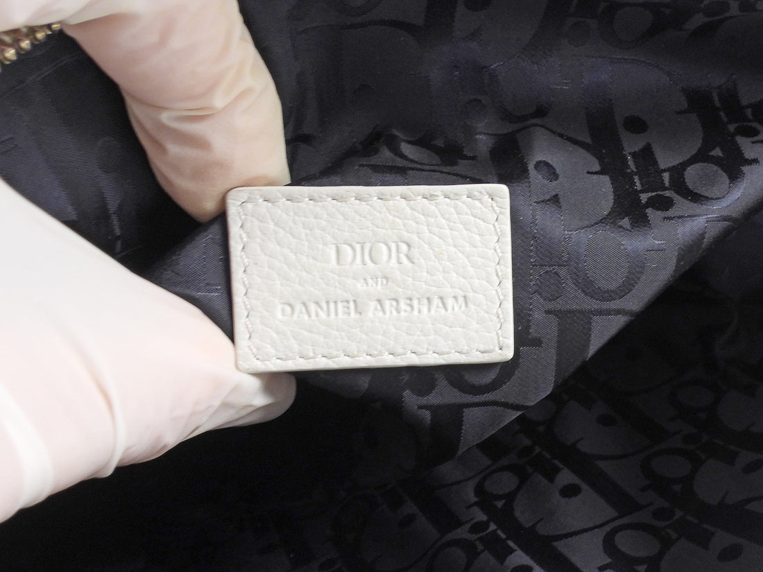 Christian Dior Homme x Daniel Arsham 2020 White Grained Calfskin Newspaper Print Saddle Bag