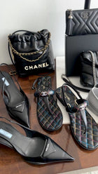 Chanel 2023 Black Leather Chain 22 Mini Bag with Ivory Enamel Logo