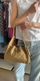 Chanel Beige 25 Matte Gold Drawstring Quilted Caviar Leather Chain Hobo Bag