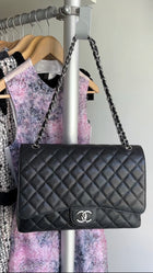 Chanel Black Caviar Maxi Classic Double Flap Bag