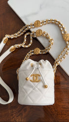 Chanel Twist Your Buttons Drawstring Bucket Bag Quilted Caviar Mini