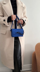Louis Vuitton Steamer Wearable Wallet Empreinte Blue