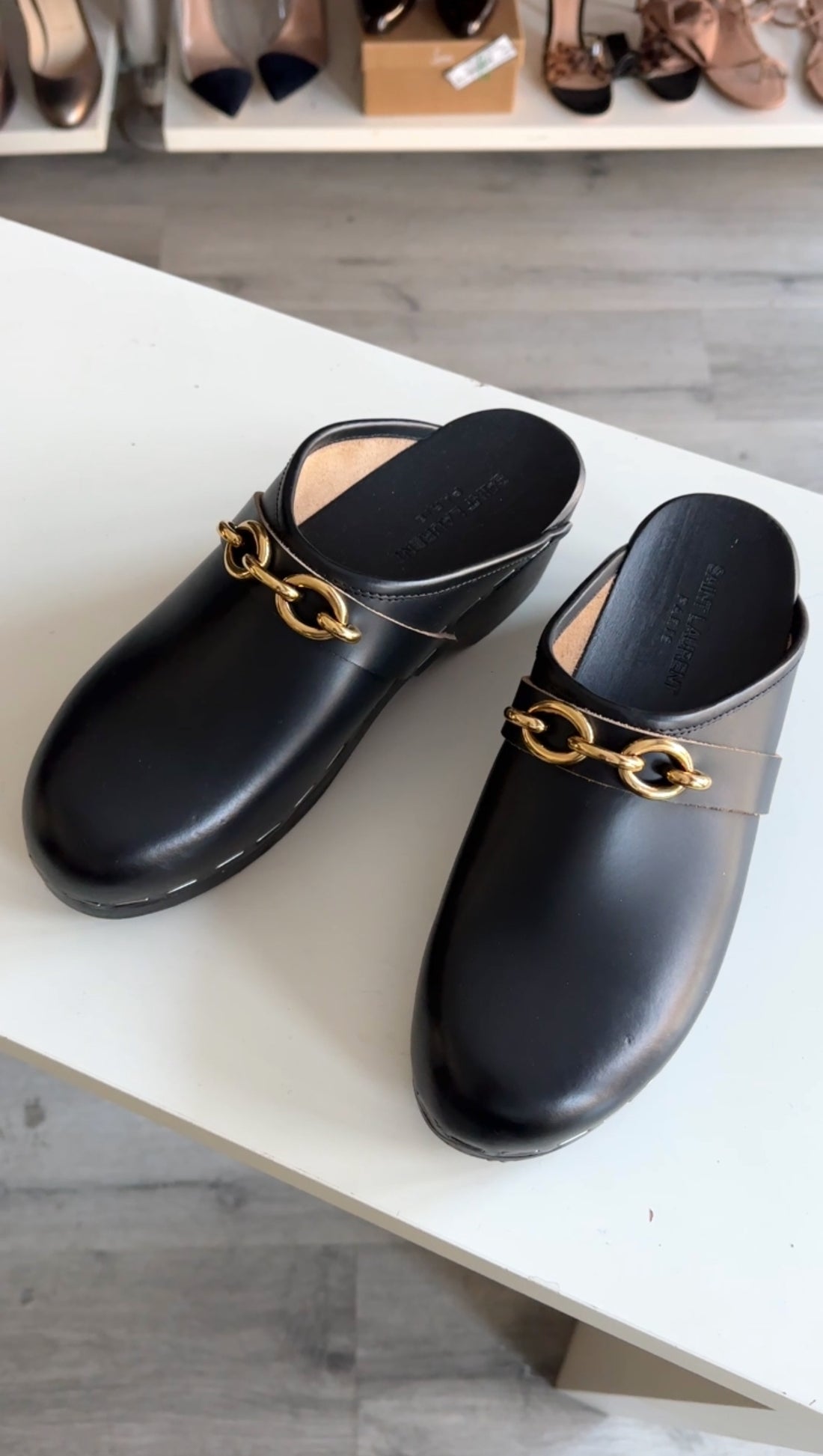 Saint Laurent Black Leather and Goldtone Chain clogs - 41