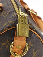 Louis Vuitton Brown Monogram Coated Canvas Speedy Bandoulière 25
