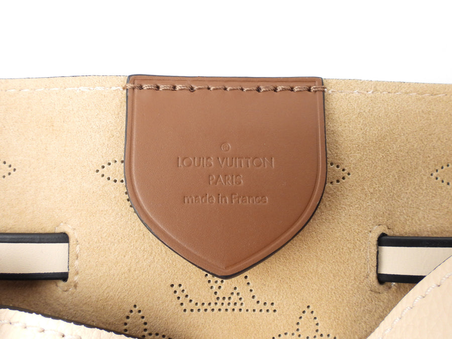 Louis Vuitton Brown Monogram Mahina Girolata Beige Leather Pony-style  calfskin ref.994141 - Joli Closet