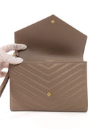 Saint Laurent Taupe Beige Grain de Poudre Matelasse Leather Cassandre Monogram Flap Wristlet Envelope Clutch