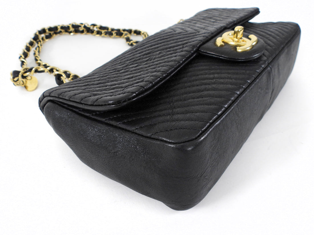 Chanel Surpique Chevron Black Quilted Leather Medium Flap Bag