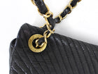 Chanel Surpique Chevron Black Quilted Leather Medium Flap Bag
