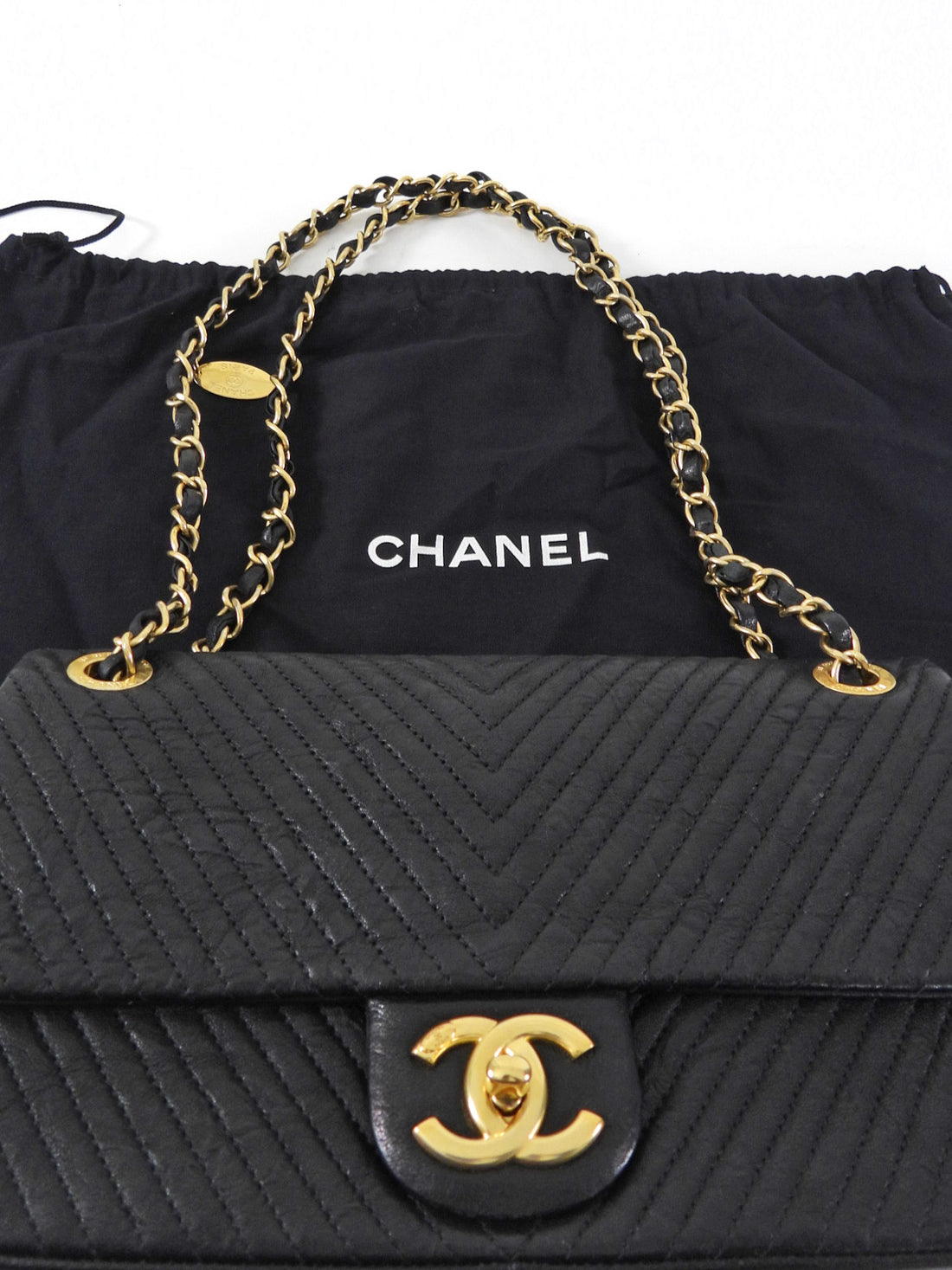 Chanel Surpique Chevron Black Quilted Leather Medium Flap Bag