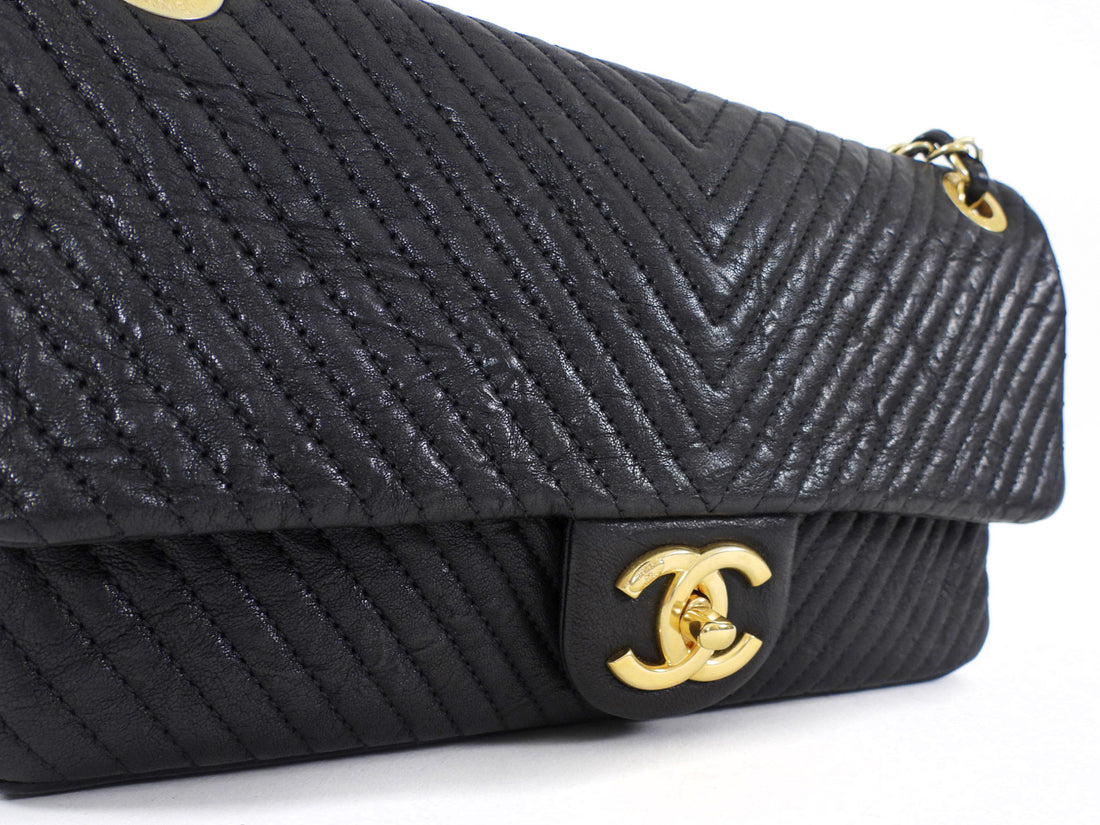 Chanel Surpique Chevron Black Quilted Leather Medium Flap Bag