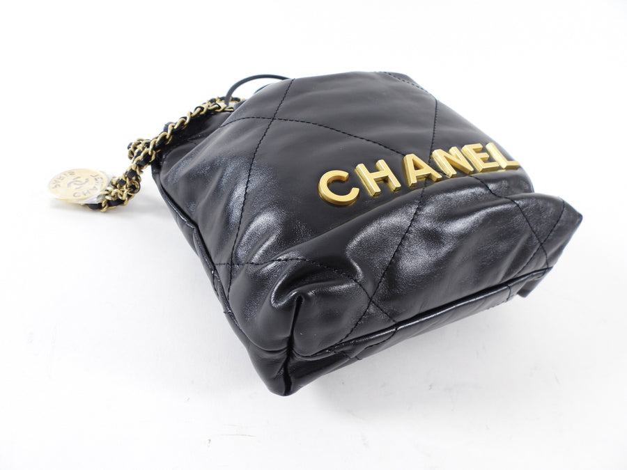 Chanel Black Leather Chain 22 Mini Bag with Goldtone Spellout Logo