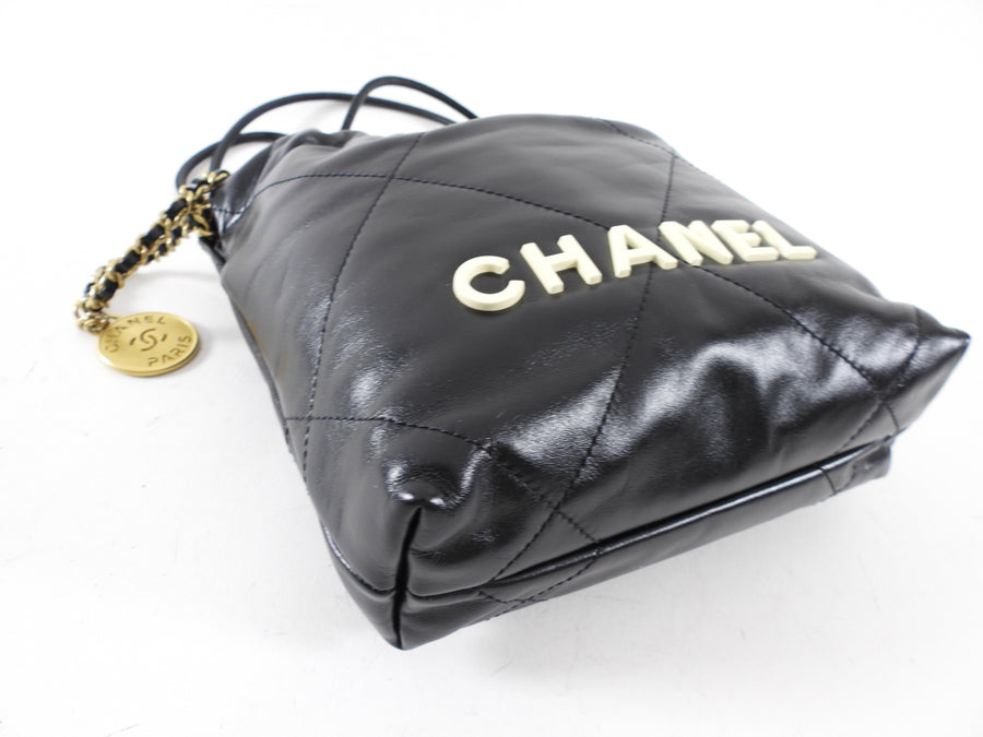 Chanel 2023 Black Leather Chain 22 Mini Bag with Ivory Enamel Logo