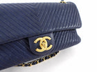 Chanel Surpique Chevron Navy Quilted Leather Medium Flap Bag