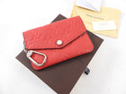 Louis Vuitton Poppy Monogram Empreinte Leather Pochette Cles Pouch