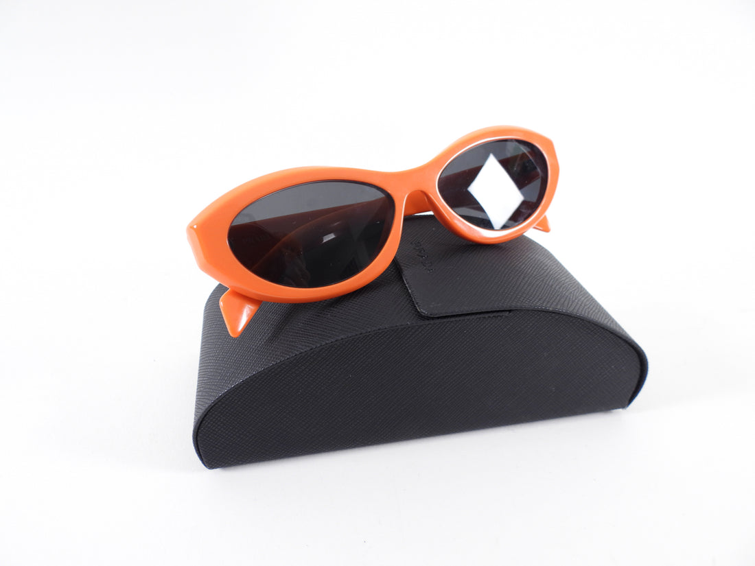 Prada Coral Acetate Oval Sunglasses