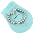 Tiffany & Co. Sterling Silver 8mm Bead Bracelet with Blue Heart