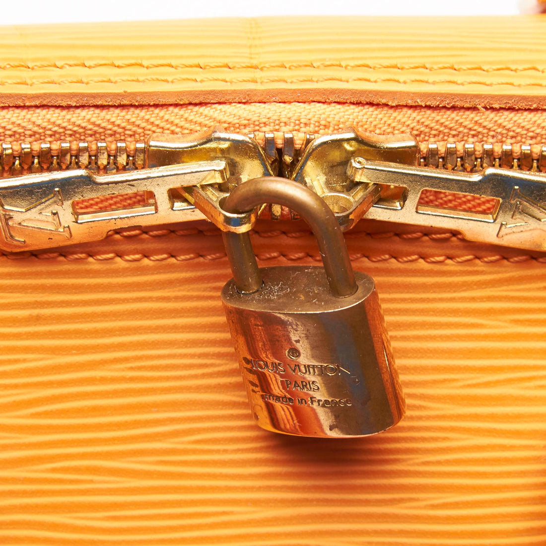 Travel bag Louis Vuitton Orange in Plastic - 16344844