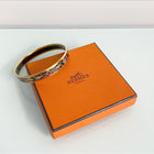 Hermes Thin Enamel Bangle Bracelet - gold / black