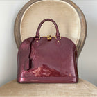 Louis Vuitton Alma PM bag in Monogram Vernis Rouge Fauviste