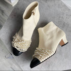 Chanel Two-Tone Ivory / Black Pearl Cap Toe Ankle Boot - 37