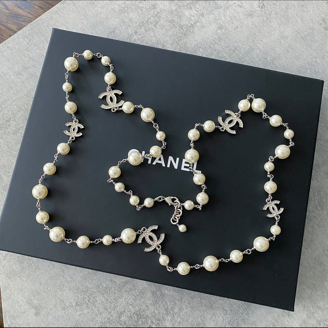 Chanel 22S Long Single Strand Pearl Necklace with Strass CC Stations