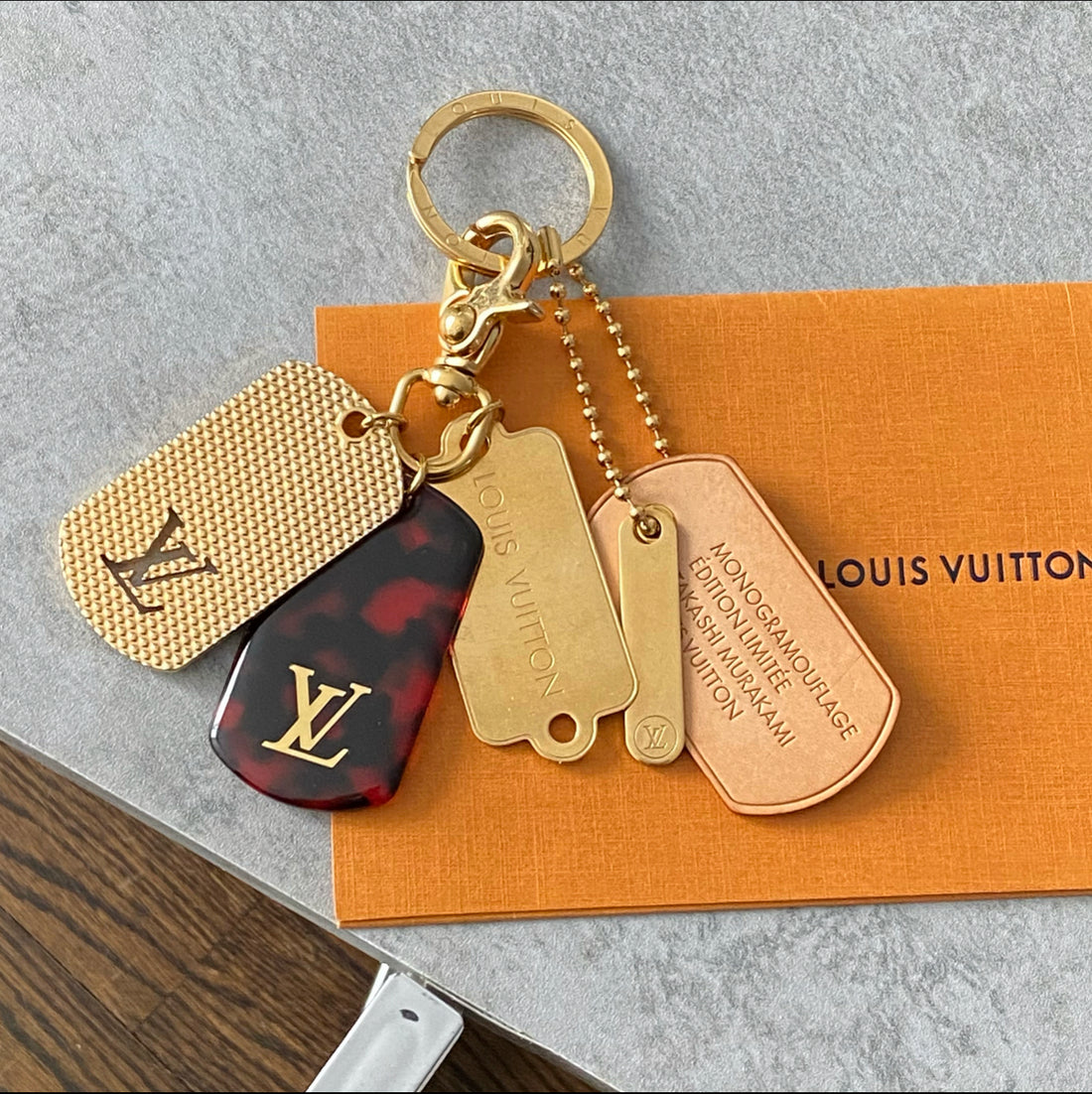 Louis Vuitton x Takashi Murakami Limited Edition Dog Tag Bag Charm – I MISS  YOU VINTAGE
