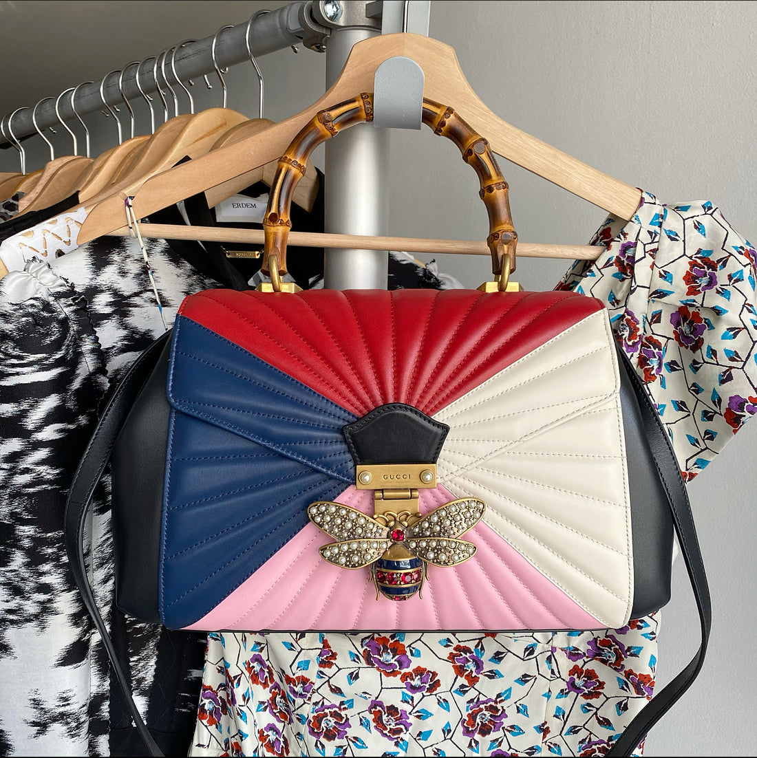 Gucci Pink Navy White Bamboo Queen Margaret Medium Bag.  Original retail $3400 USD / $4150 CAD.  Pleated leather bag in pink, navy, and white, with bamboo handle, leather shoulder strap, and jewelled bee clasp.  Medium size measuring 12.5 x 8.25 x 3.75” with an 18.25” strap drop.  Excellent condition - appears to be brand new and uncarried.  Includes duster, box, strap, clochette, care pamphlet, controllato paper, leather swatch, protective packaging, and Entrupy certificate of authenticity.