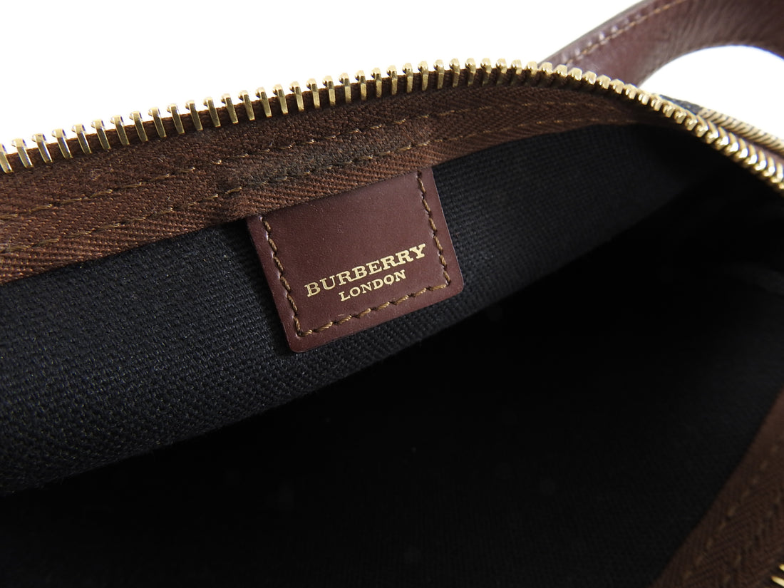 Burberry Nova Check Plaid Small Pochette Bag. Coated canvas signature nova  check body with brown leather trim. Measures - 8.75 x 5.25 x…
