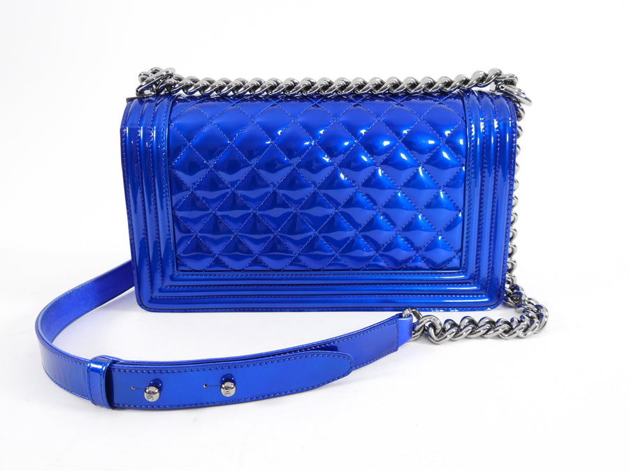 Chanel, boy bag in metallic blue Leather Patent leather ref.1002674 - Joli  Closet