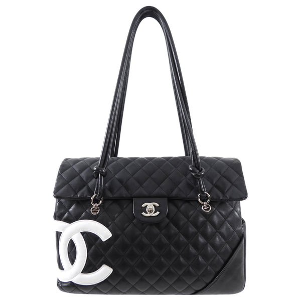 Vintage Chanel Cambon Flat Messenger Black and White Lambskin Silver H –  Madison Avenue Couture