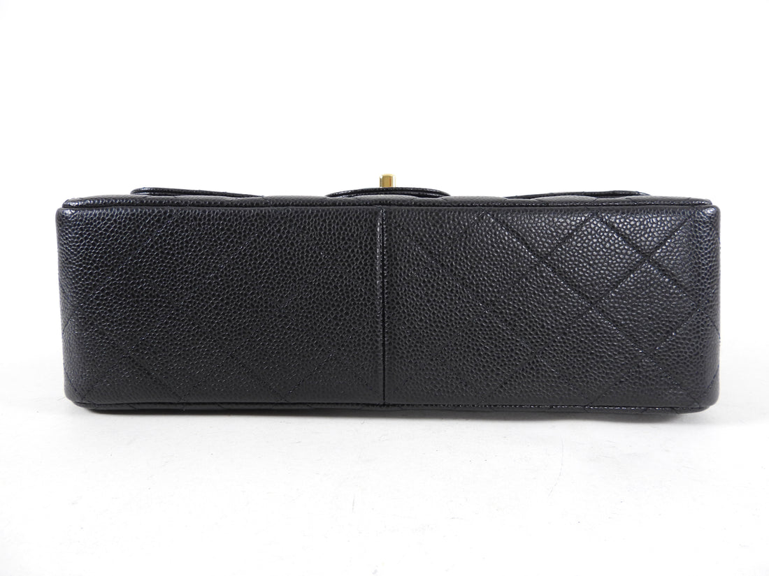 Vintage: Chanel Classic Navy Caviar Leather Jumbo Double Flap with Sil –  The Hangout