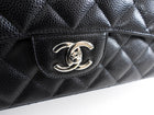 Chanel Black Caviar Maxi Classic Double Flap Bag
