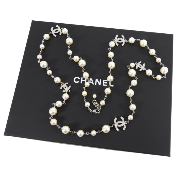 Chanel 22S Long Single Strand Pearl Necklace with Strass CC Stations – I  MISS YOU VINTAGE