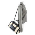 Chloe Alice Ivory and Black Two Tone Shoulder Bag.  Double handles, zippered top, long shoulder strap.  Measures 14.5 x 7.75 x 8.5” with a 21” strap drop.  Excellent pre-owned condition without any signs of visible wear.  Without duster. 
