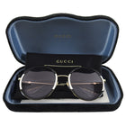 Gucci Black and White Round Light Tint Sunglasses GG0061S