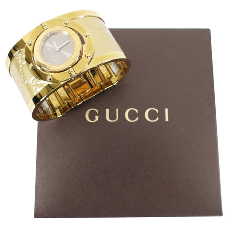 Gucci Gold Monogram Twirl Bangle Cuff Watch 112