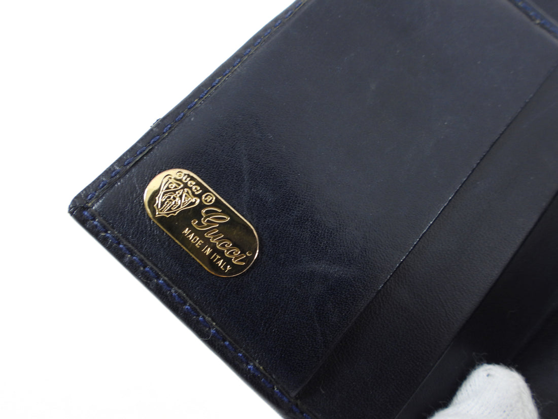 GUCCI 80s Monogram Flap Wallet — Garment